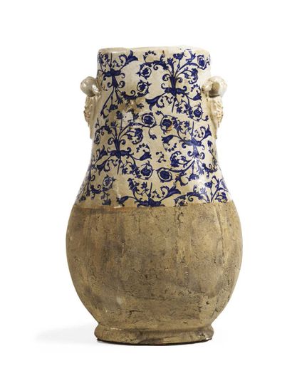 Enamelled stoneware vase with blue foliage...