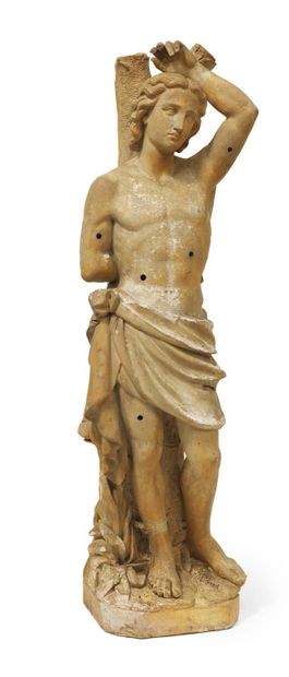  SAINT SEBASTIAN in terracotta sculpted in the round, standing with his left arm...