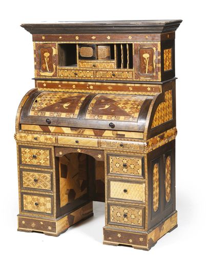null A yosegi marquetry chest of drawers decorated with geometric and star motifs....