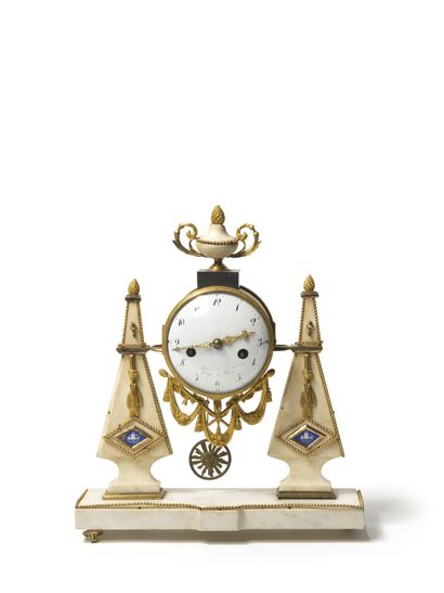 null 
A white marble PORTICAL HANGER with chased and gilt bronze trim. White enamelled...