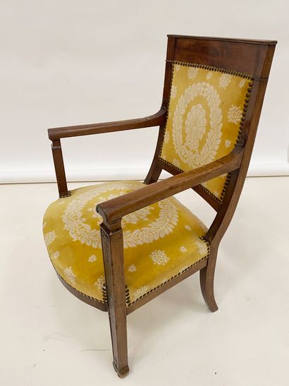 null Carved natural wood armchair. Directoire period Yellow velvet upholstery with...