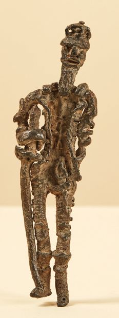 null Lead figurine known as Seine lead. With a long silhouette, it represents a bearded...