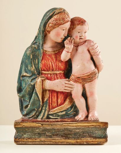 Madonna in polychrome and gilded stucco,...