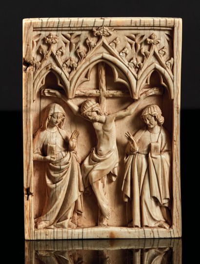 null Right leaf of a deeply carved ivory diptych representing the Crucifixion under...