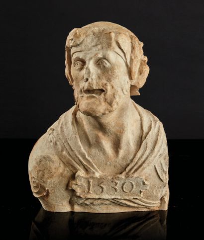 Bust of a helmeted man in sculpted limestone....