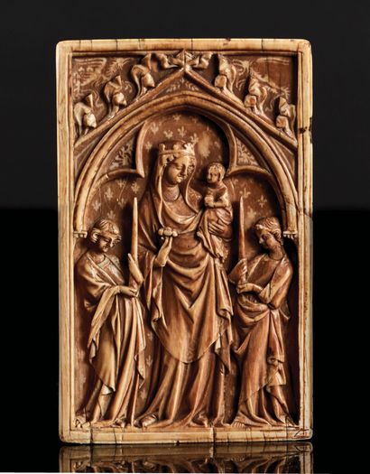Left leaf of a carved ivory diptych representing...