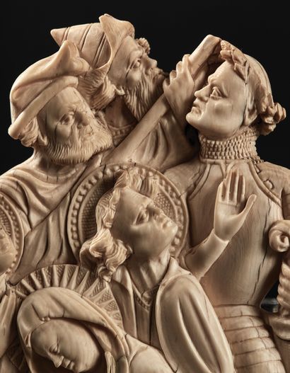 null Rare ivory group carved in bas-relief with slight traces of polychromy representing...
