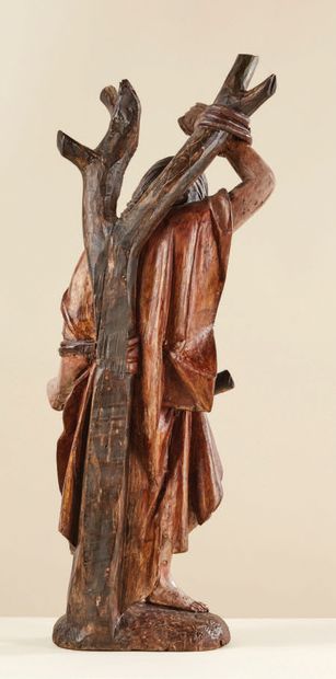 null Saint Sébastien en bois sculpté, polychromé et doré, dos ébauché. Le saint est...