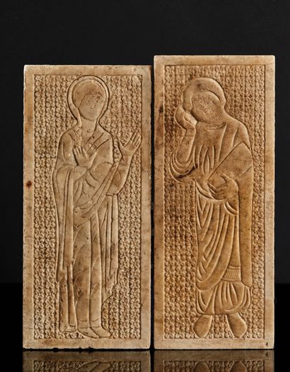 Rare pair of marble plaques carved in reserve...