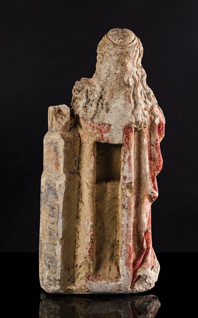 null Saint Barbara in sculpted and polychromed limestone, back partly hollowed out....