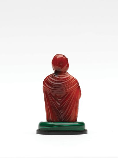 null Bust of Virgin in prayer in amber sculpted in the round.
Dressed in a veil forming...