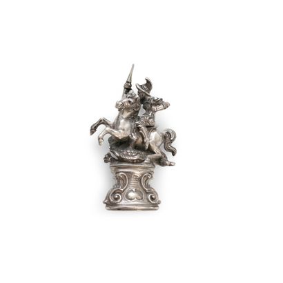 null Richly carved silver seal of Saint George slaying the dragon. 

H_6,6 cm 

Weight:...