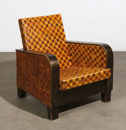 TRAVAIL SCANDINAVE (XXe siècle) Armchair
Wood and weaving of wood
About 1930
Armchair...