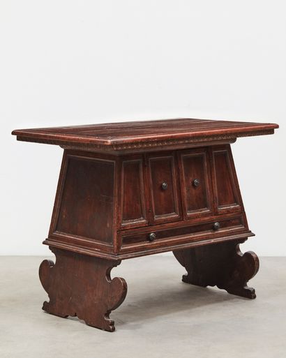  RARE MIDDLE TABLE in walnut opening to two doors and a drawer. Decorated with molded...