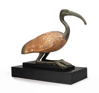 null VOTIVE STATUTE representing the god Thoth in the form of an ibis at rest. Stuccoed...