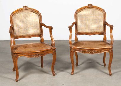 PAIR OF ARMCHAIRS with cane bottom in molded...