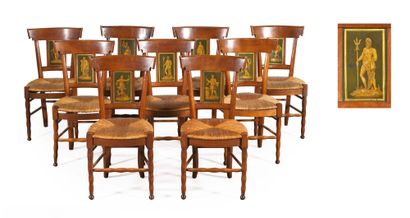 null SET OF NINE PAINTED CHAIRS in natural wood. Sabre or ringed feet with spherical...