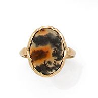 null 14K (585) gold ring, set with a cabochon of moss agate in closed setting with...