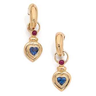 null Pair of 18K (750) gold earrings, holding a heart-shaped pendant enhanced with...