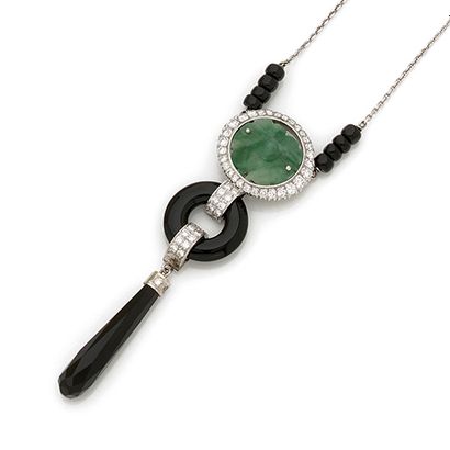 null Necklace in white gold 750 thousandths, decorated with a plate of engraved jade...