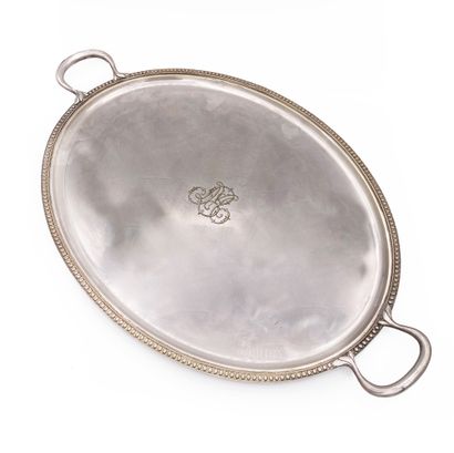  Two silver plated trays, one round with contours and the other with a frieze of...