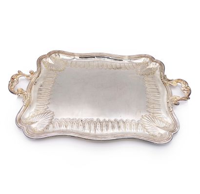null Two silver plated metal trays in the rocaille style, one engraved, the other...