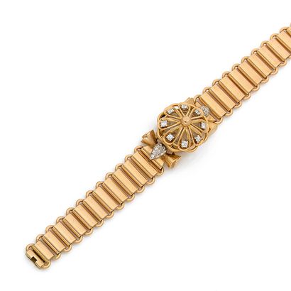 Bracelet montre de dame en or 18K (750) et...