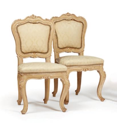 null 
Four "musician's" chairs and two armchairs in white lacquered wood covered...