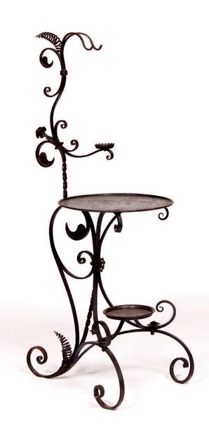 In the style of Carlo Rizzarda Wrought iron...