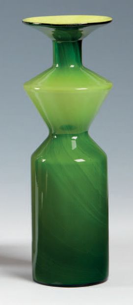 Geometrically shaped vase or bottle in green...