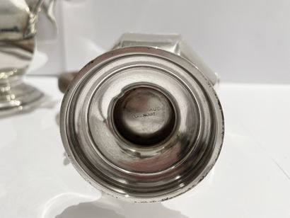 null Silver set including a sugar bowl, a sugar tongs and a cream pot Olie Caron,...