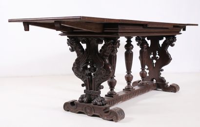 null Table with extensions in oak, lion head base. 19th century. H_130 cm W_70 cm...