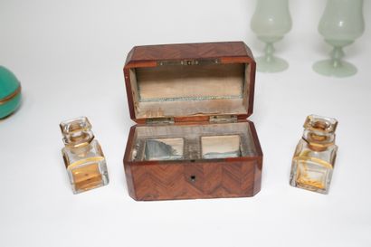 null Lot including: - a perfume box with two glass bottles in a rosewood veneer case,...