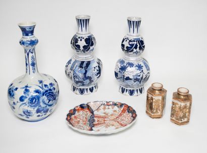null Ceramic set including : - A set of three Delft earthenware vases including a...