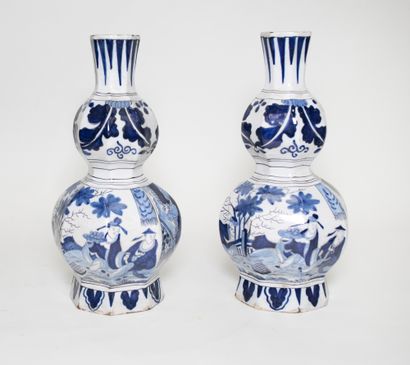 null Ceramic set including : - A set of three Delft earthenware vases including a...