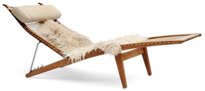 HANS J. WEGNER (1914-2007) Chaise longue JH-524 Chêne et cordage Réalisée par Johannes...