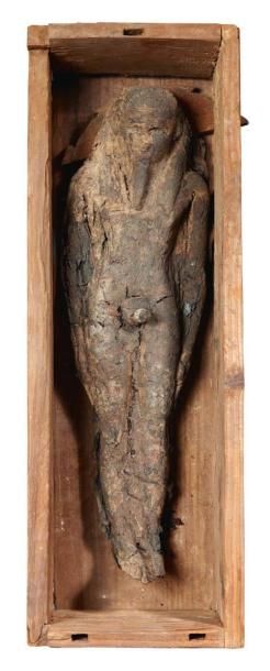 null Osiris végétant. Figurine d'une pseudo-momie d'Osiris ithyphallique, coiffée...