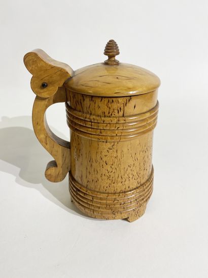null Mug in birch from Karelia carved in imitation of a barrel. 

Russian work of...