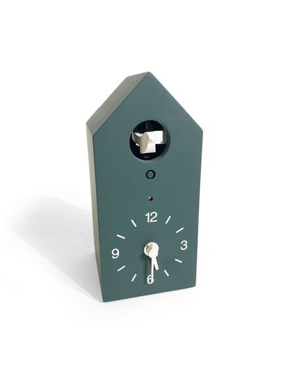 null Small modern cuckoo clock in the shape of a green house. 

H_20 cm
