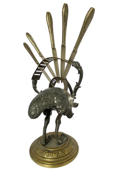 null Metal ostrich knife holder with 5 knives. 

Poland (deformation). 

Without...