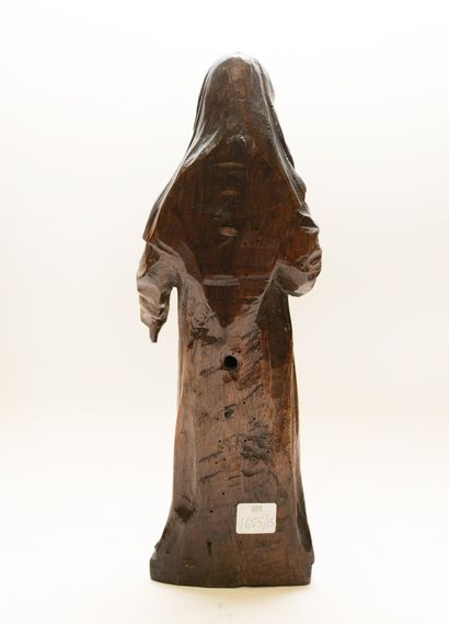 null Ecole française du XIXe siècle. 

Statuette en bois sculpté représenant une...