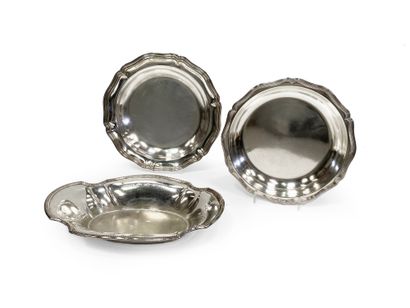 null CHRISTOFLE 

Lot in silver plated metal including two circular dishes with curved...