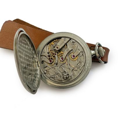 null LONGINES Vers 1930

23034

Montre de poche en acier de type chronographe, cadran...