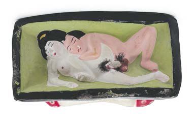 JAPON - Début XXe siècle Two groups in polychrome plaster, young woman nursing lying...