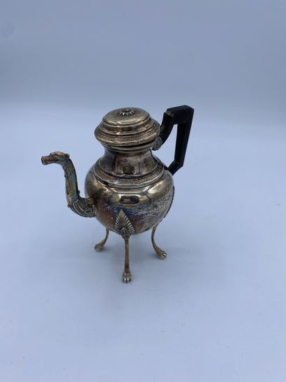 null Lot including: - a teapot, H_17 cm - a sugar bowl, H_14 cm - a mustard pot H_13,5...
