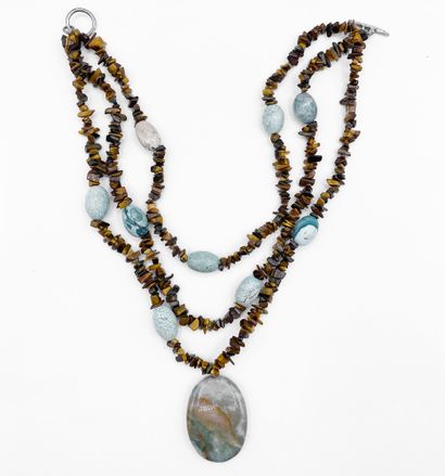 null Necklace composed of 3 rows of polished tiger eye beads of fancy size punctuated...