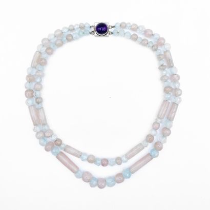 null Necklace composed of a double row of faceted aquamarine pearls alternated with...