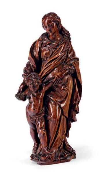 null Vierge et l'Enfant en bois fruitier sculpté. La Vierge debout, le pied droit...