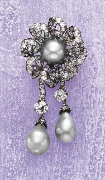 null An Important Grey Natural Pearl and Diamond Brooch circa 1900 center ing upon...