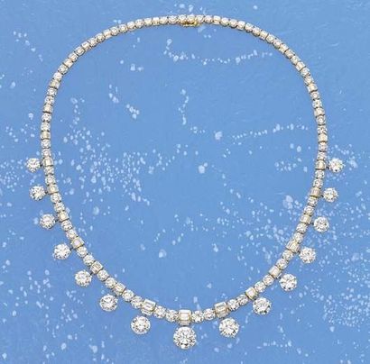 null A Diamond Necklace circa 1960 Designed as a series of circular-cut and baguette-cut...